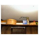 Cheese box and jar of spools in craft closet