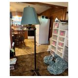 Floor lamp with cast iron feet