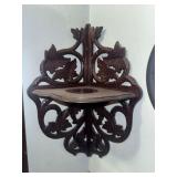 Carved corner wall shelf