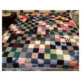 Scrappy block pattern quilt top