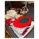 Large group of Christmas decor, linens, games and toys