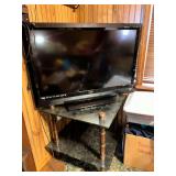 Flat screen TV and vintage table