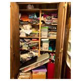 Contents of sewing/craft closet inside craft room