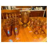 17 piece amber carnival grape pattern water set- pitcher, 8 tumblers and 8 stems