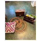 Assorted Home Decor Grouping Featuring Wooden Organizers, Wicker Chargers, and Decorative Pillow