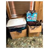 Boxes of hand bags and clothing