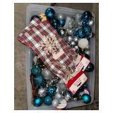 Tote of Christmas ornaments and wine bags