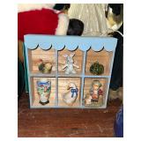 Blue wooden shadow box with ceramic and porcelain figurines-goose, vase, bunny, bird