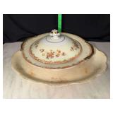 Porcelain serving dish with lid and platter