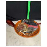 Vintage wrist watches and coin purses in pottery bowl