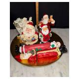 Santa clause figures on tray