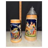 2 vintage relief molded German beer steins one with lid