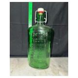 Geeen tequila bottle with swing top