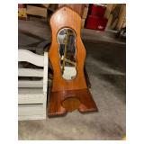 Wooden mirrored wall sconce