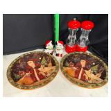 Decorative Santa plates, Christmas cat shakers and red salt and pepper mills