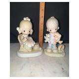 2 precious moments figurines