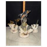 Hand blown sea creatures on coral with art glass dolphin