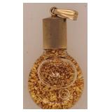 1 1/4" Glass Bottle Pendant w/ Gold Flakes (?),