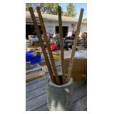 Watering Can and Yardsticks