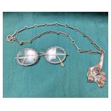 Eyeglasses and Necklace