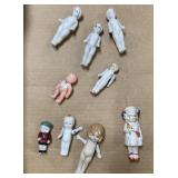9 Miniature Dolls