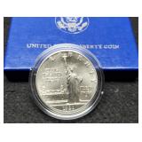 1986 Liberty Comm. Silver Dollar Unc. w/ Case