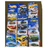 12 Hot wheels New on Cards