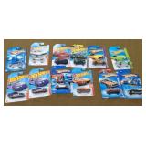 12 Hot wheels New on Cards