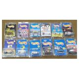 12 Hot wheels New in Kar Keepers