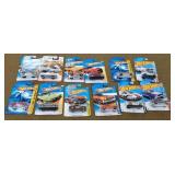 12 Hot wheels , New on Cards