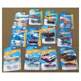 12 Hot wheels New on Cards