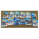 12 Hot wheels New on Cards