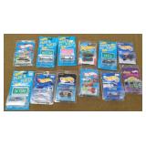 12 Hot wheels New on Cards