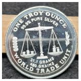 1 Troy Oz. Silver World Trade Unit Round