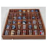 32 Shot Glasses on Display Cabinet