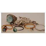 5 Costume Rings & Charm Bracelet