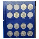 Kennedy Half Dollar Album with 4 Silver Coins