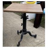 Table with Iron Rolling Base