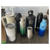 Tote of Metal Travel Bottles