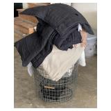 Baskets Full of Bedding and Blankets