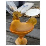 Amber Rooster on Nest