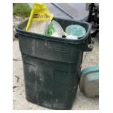 Trash Can of Older Lawn Supplies
