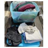 Tote with Lid Full of Towels, Oven Mits