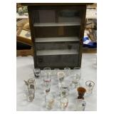 Shot Glasses in Display Case