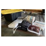 Tote with Lid Full of Bedding