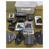 Tote Full of Holsters and Scope Rings