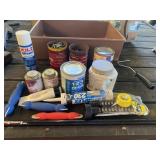 Tub Full of Hardware and Chemicals