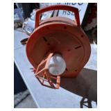 Cord organizer with light bulb