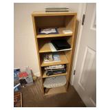 Bookshelf with mis contents