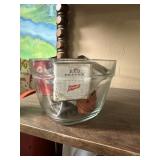 Glass measuring cup w/misc metal spice cans